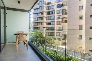 Chic Apartment with Balcony & Pool in Las Condes