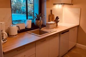 Holiday home with sauna and whirlpool