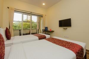 Hotel O Divine Residency Near Phoenix Marketcity