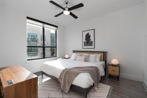 2BR Highrise Balcony View Near FIFA at NRG