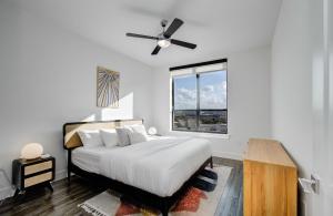 2BR Highrise Balcony View Near FIFA at NRG