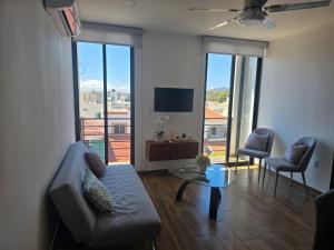 hermoso departamento totalmente equipado ,céntrico, aberca, elevador , estacionamiento privado
