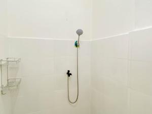 Homey and Compact 2BR Cibubur Village Apartment By Travelio