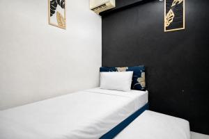 Homey and Compact 2BR Cibubur Village Apartment By Travelio