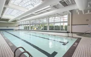 2 Bedroom ,2 Full Bathrooms, 500sf Private Terrace Deck, Office, Pool, Sauna, Hot Tub, EV Parking