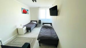 Apartamenty Bałtycka 4 - Biały Dom
