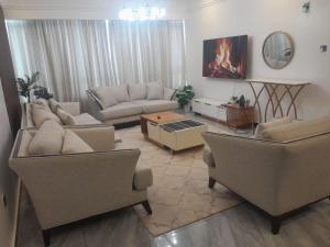 modern executive three bedroom apartment which features a swimming pool, state of the art fully equipped gym andmodern unmatched luxurious facilities which offfers luxury lifestyle