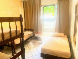 Toca da Mona Roots Hostel