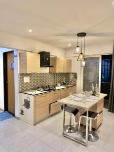Kharadi 10floor Stylish 2BHK Cozy Brick Walls