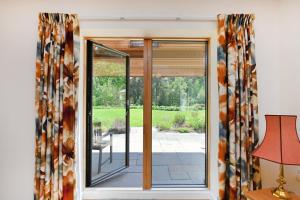 Eco 2-Bed Bungalow with Biodiverse Garden & Solar