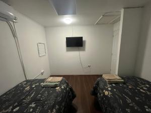 Hostel Tu Espacio RE - Habitaciones cerca del Aeropuerto