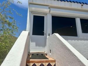 Oceanfront Condo Patio and shared Pool Casita Mar y Sol