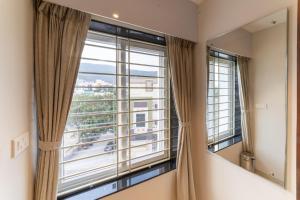 Lumina Stays-Modern Luxury Rooms, Near NAD