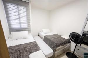 Apartamento de 3 Habitaciones 2 TV con parqueadero cerca al estadio