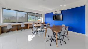 Modern condo loft in Zoho Skies with a roof pool