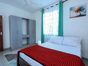 Azurah Coastal Stays Nyali - Fast WiFi ,Self Check-in , Quiet Neighbourhood