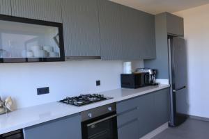 Apartment with pool and sea view 300 m from beach