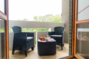Casa Mara - Central Carbonia, AC, private balcony & full kitchen