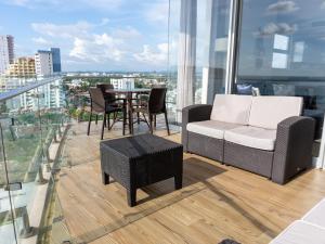 Luxury condo with balcony and front ocean view
