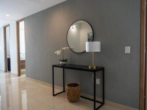 Luxury condo with balcony and front ocean view