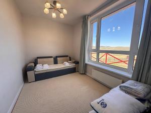 Cozy year-round cottage near UB with additional pick-up service from the Airport