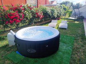 Oasi Relax con Jacuzzi e Giardino Privato