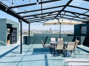 Loft #104 en Centro Histórico con Terraza Compartida y Patio Privado