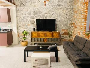 Loft #104 en Centro Histórico con Terraza Compartida y Patio Privado