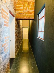 Loft #104 en Centro Histórico con Terraza Compartida y Patio Privado