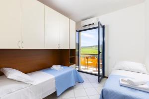 Blue Horizon Living - Vista Mare e Parcheggio img11