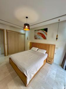 RES Appartement Contemporain & Raffiné - Quartier Guéliz - Tout à Pied - Parking - Wifi - Netflix