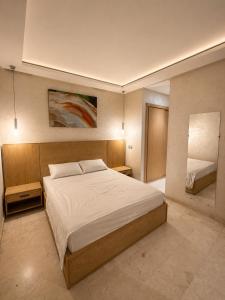 RES Appartement Contemporain & Raffiné - Quartier Guéliz - Tout à Pied - Parking - Wifi - Netflix
