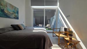 Loft luminoso con patio privado