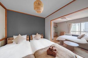 Den SUSUKINO ROOMS
