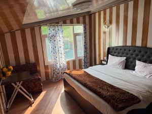 Zabaish Riverside Cottage