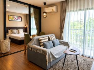 Stylish 1BR Condo Rawai Walk to Beach PoolsGym