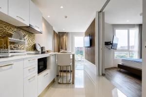 Cozy 1BR Condo Near Central Phuket with Pool Gym Game Room and Cinema