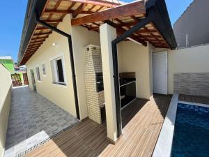 Piscina-churrasqueira-5 min da praia - EntreMareSonhos