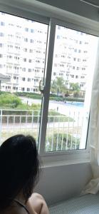 Field Residences Pool View with Balcony Near Airport behind SM sucat