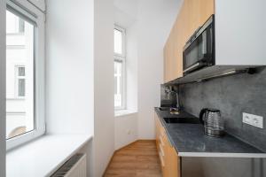Piotrkowska Cozy Studio by BookingHost