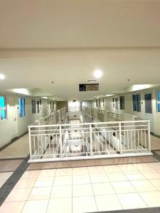 Kai Garden Residences, Staycation Condo, 2 Bedrooms - 1 Bathroom - Kitchen, with Aircon, 65 inches TV - Free Wifi - Mandaluyong City