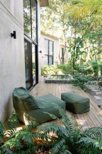 Tropical zen loft steps from the beach