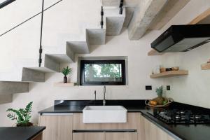 Tropical zen loft steps from the beach