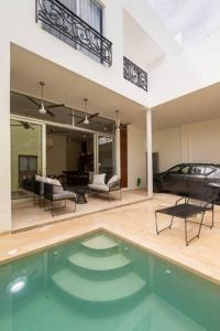 Casa Ya ax Oasis with Pool and Rooftop Bar