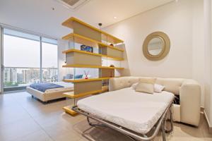 Distrito 90 - Estudios y Apartamentos para vacaciones y viajes de negocio