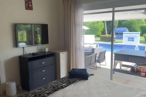 Casa con Piscina Privada, Air Hockey y Bolirana