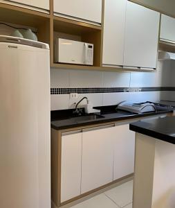150m da Praia das Toninhas Com Varanda Gourmet