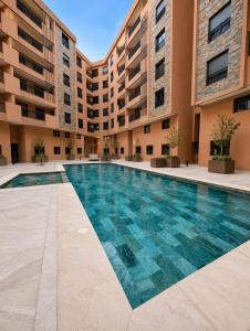 Luxury Apartment 2Bd Residence with Pool & Private Parking