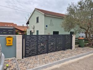 Holiday house with a swimming pool Kakma, Biograd - 25530