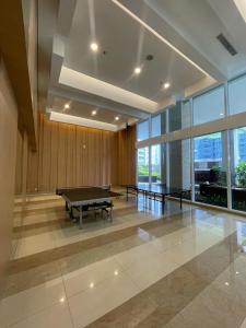 Homey Cozy Staycation Podomoro Apartment - Strategic Location